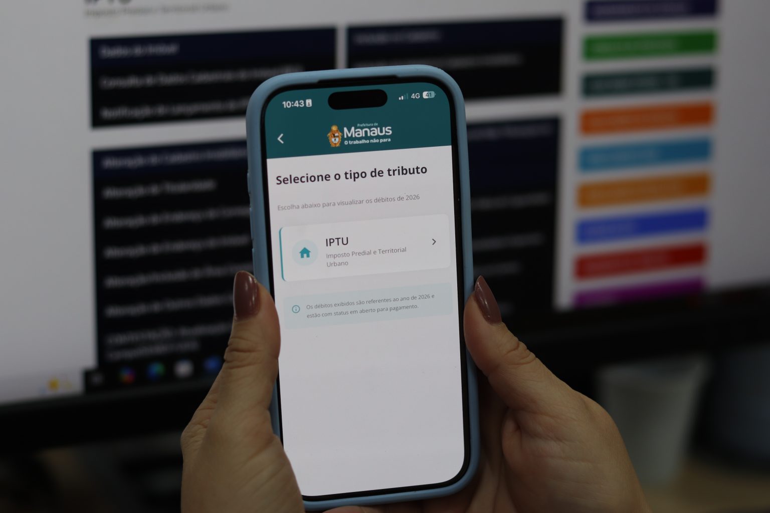 Aplicativo Manaus Atende no celular para emissão do carnê digital do IPTU 2026 em Manaus.